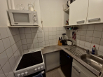 Küche - ERDGESCHOSSWOHNUNG MIT KLEINER KÜCHE UND DUSCHBAD